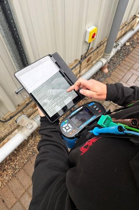 Electrician in Chesham testing a commercial electrical installation